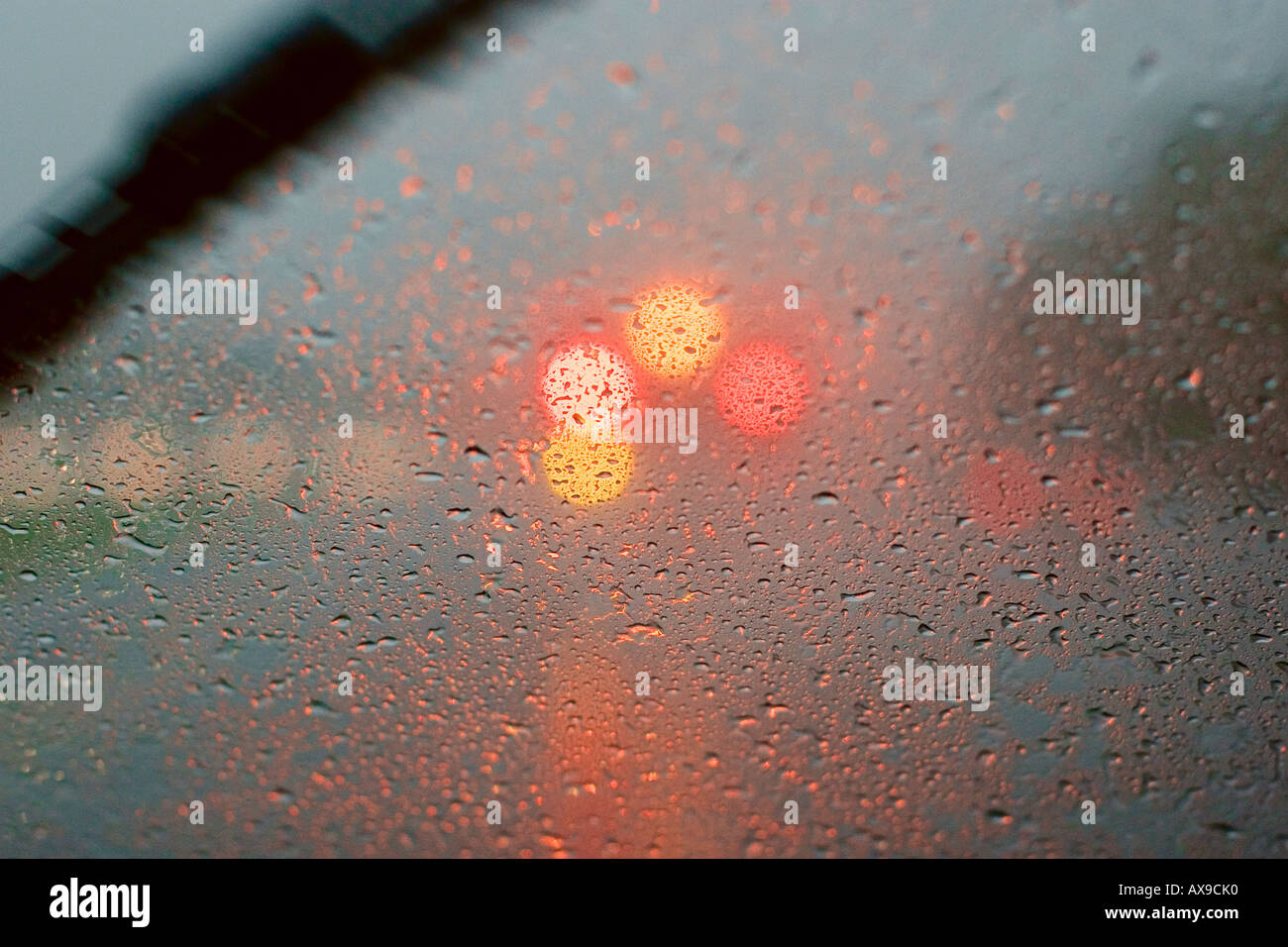 Cars driving along wet road at dusk  2006. New Jersey Turnpike, USA Stock Photo