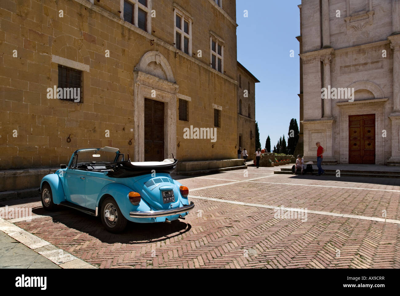 blue open top VW Beetle parked with its top down Stock Photo