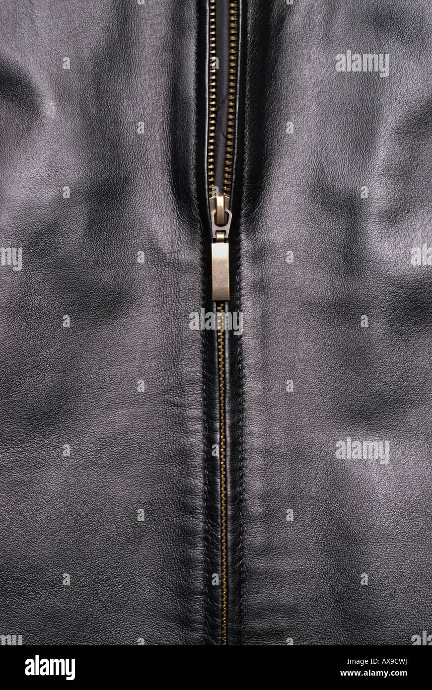 Close up of a black leather jacket and a gold zipper Stock Photo Alamy