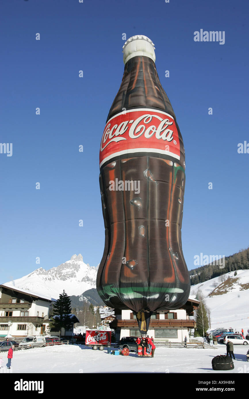 Hot-air balloon in the shape of a Coca-Cola bottle, Filzmoos, Austria Stock Photo