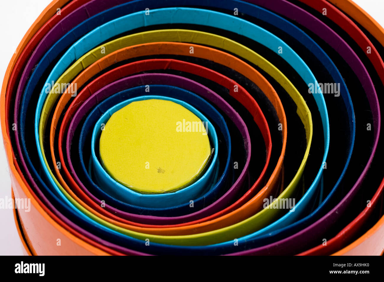 round colourful gift boxes of different sizes one inside the other