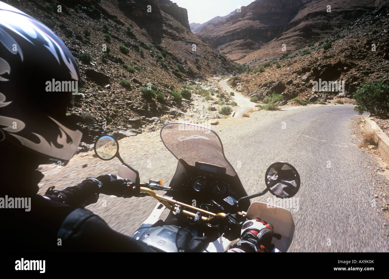 Motorbiking down Ait Mansour Gorges, in the Anti Atlas mountains, near Tafraoute, Southern Morocco Stock Photo