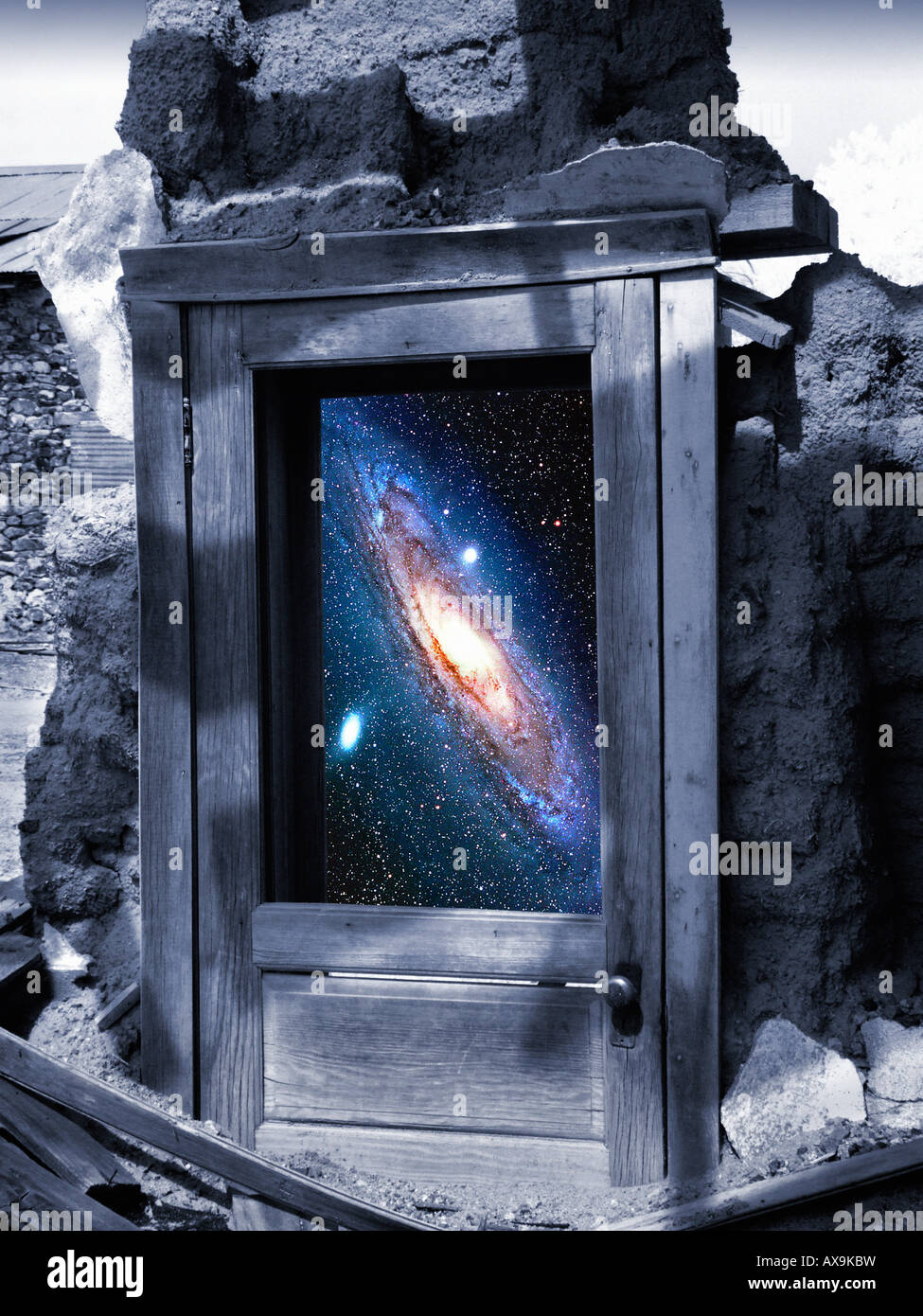 Surreal photoillustration of galaxy in abandoned door. Stock Photo