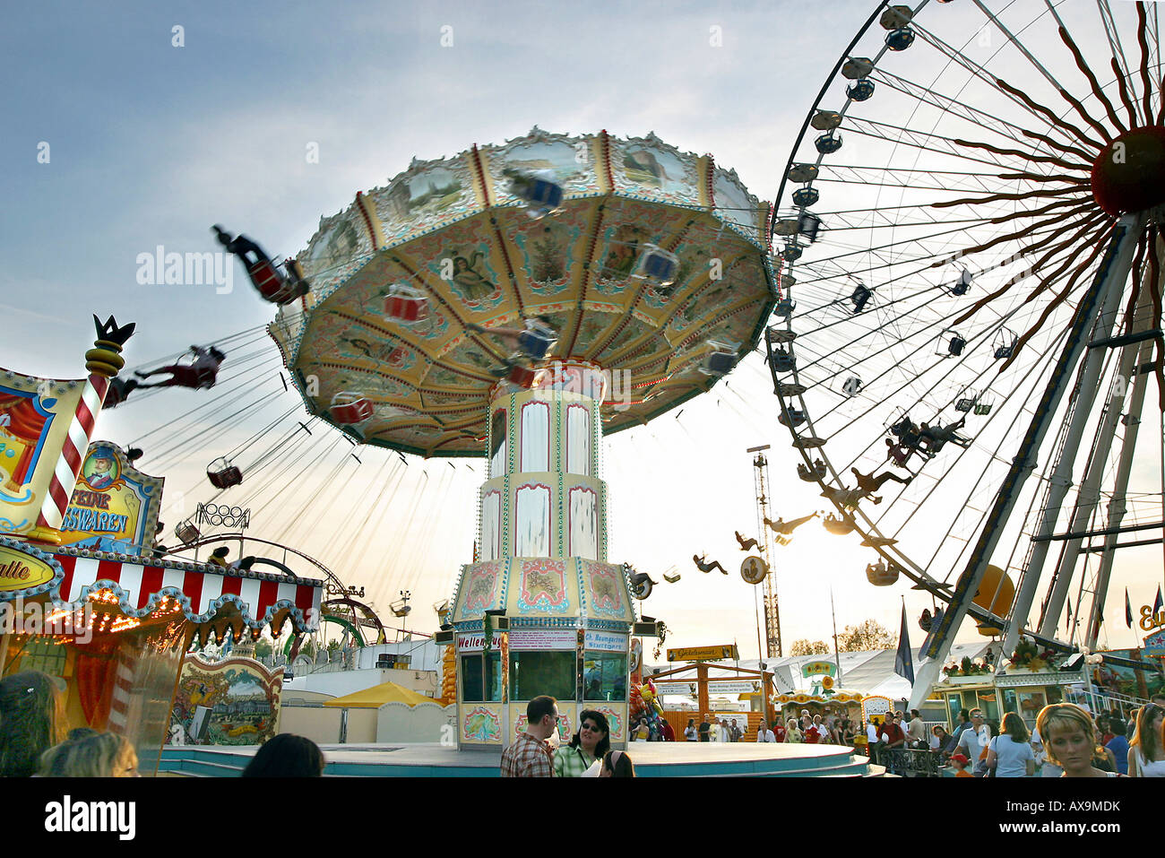 People in an amusement park Stock Photo - Alamy