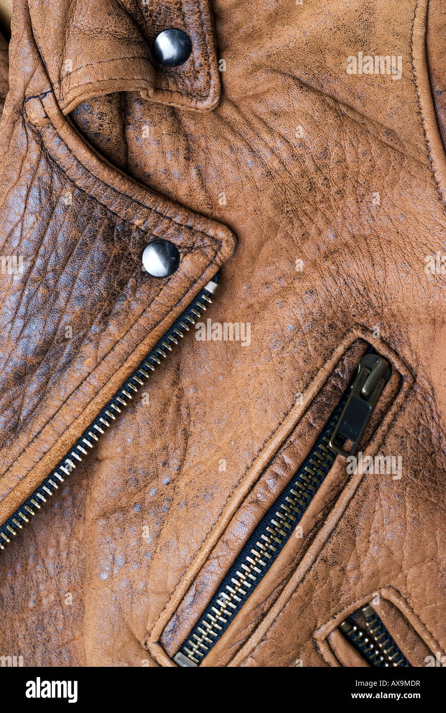 Close up of a worn brown leather jacket Stock Photo