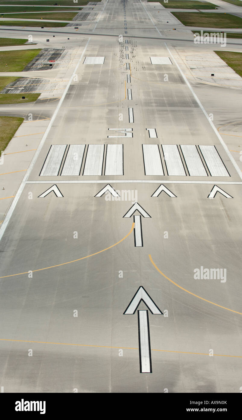 arrows on airport runway landing strip Stock Photo Alamy