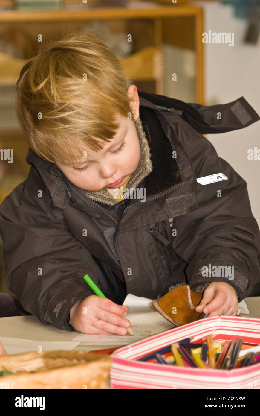 Child boy drawing classroom Stock Photo - Alamy