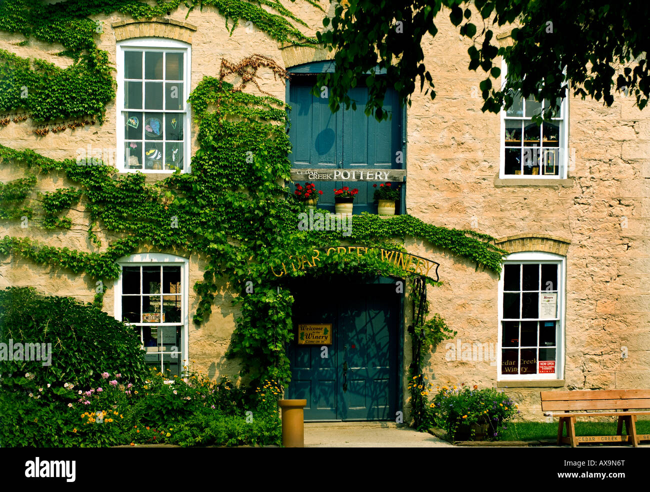 The Cedar Creek Winery in Cedar Creek Settlement a shopping area in Cedarburg Wisconsin in a restored mill Stock Photo