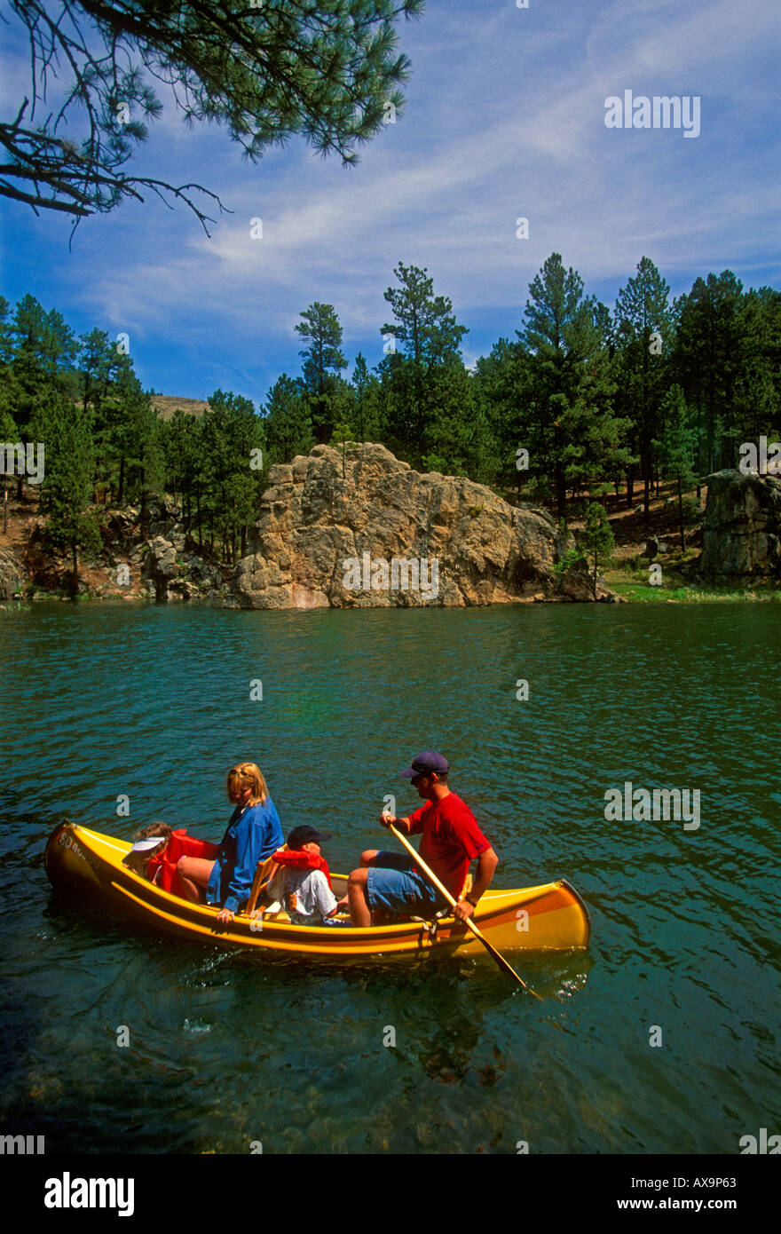 people, mother, father, children, family, canoe, canoe ride, canoeing, canoeing on lake, family vacation, Custer State Park, Black Hills, South Dakota Stock Photo