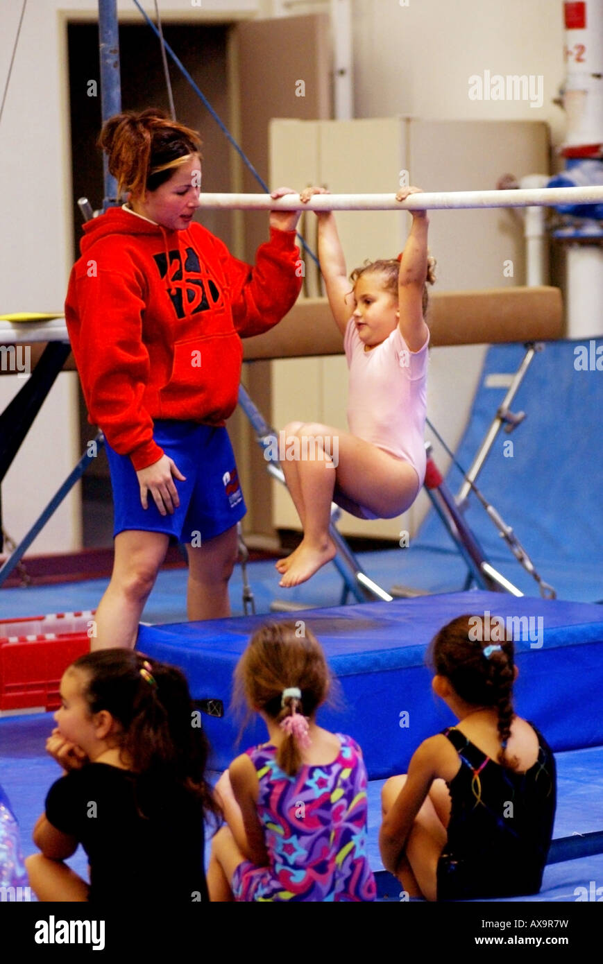 children perform gymnastics routines. Stock Photo