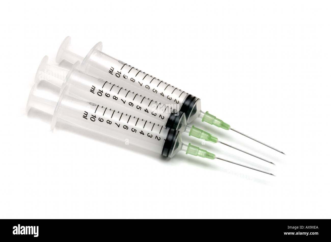 3 three 10ml Plastic disposable injection syringe with needle on white background Stock Photo