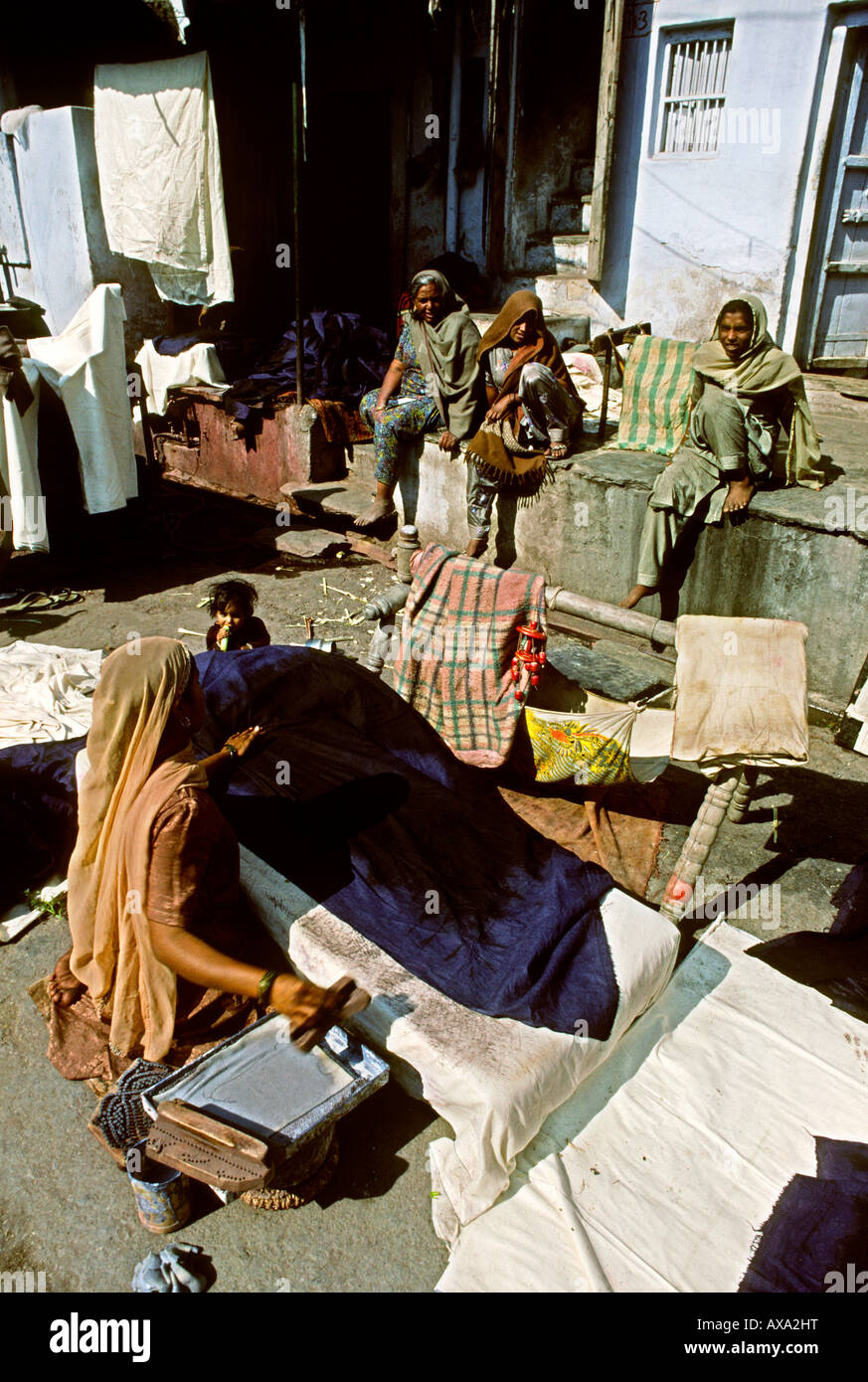 India Rajasthan crafts Ahar near Udaipur woman block printing fabric in