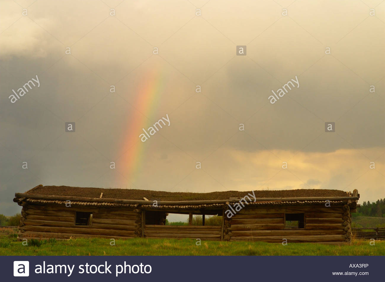 A Bright Rainbow Falls On The Roof Of The Cunningham Cabin A