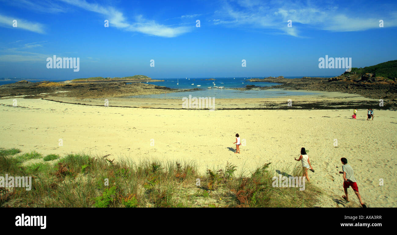Beach with people at the north end of Ile Ebihens, the island north of St Jacut de la Mer, Cotes d'Armor, Brittany, France Stock Photo