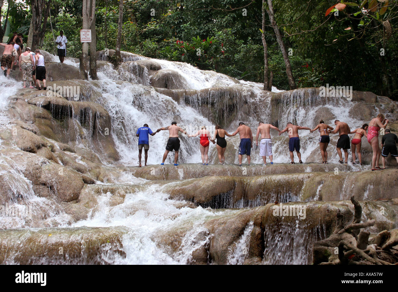 People climbing Dunns River Falls Ocho Rios Jamaica Stock Photo