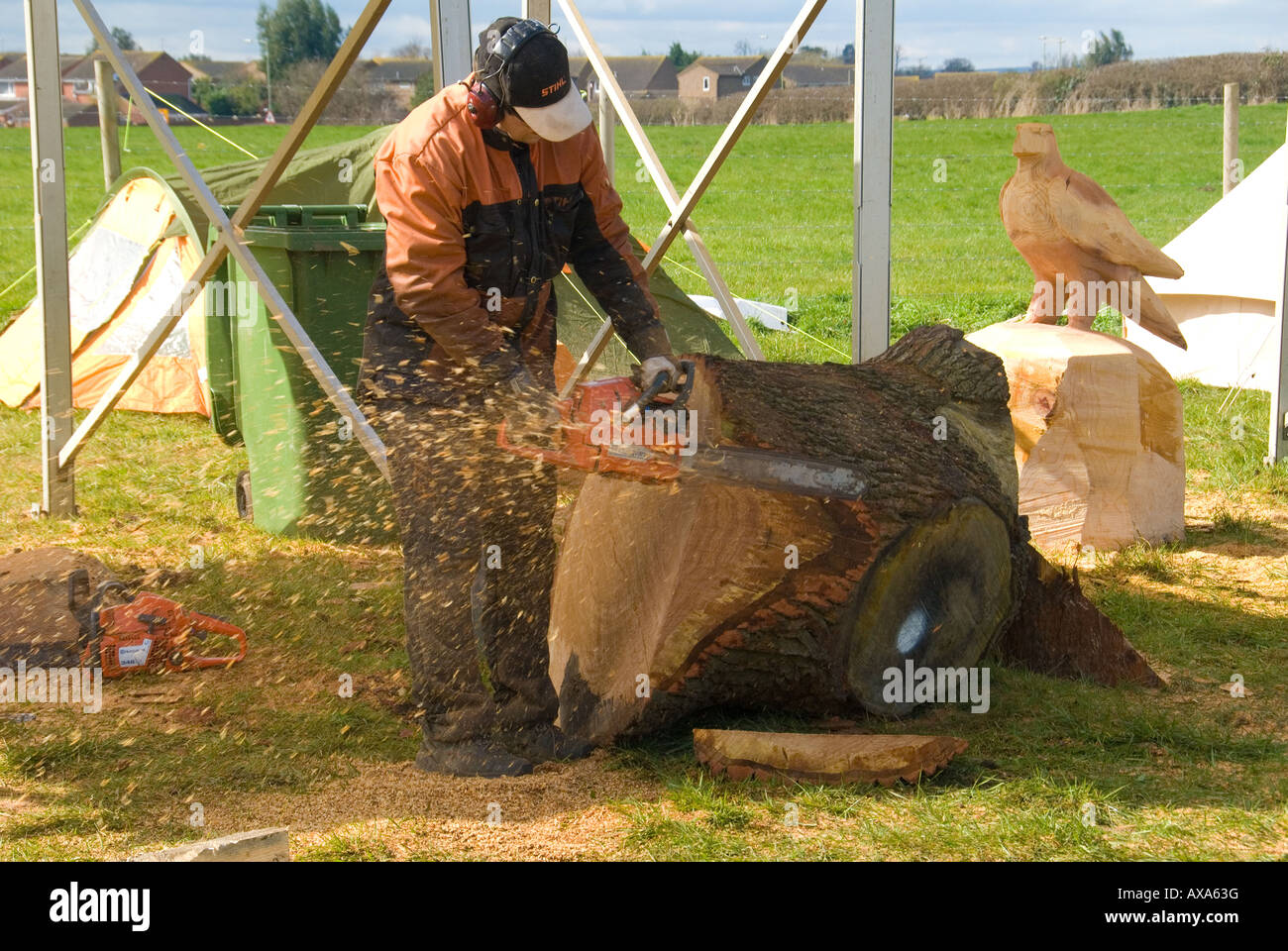 A Wood Carver Using a Chainsaw Stock Photo Alamy