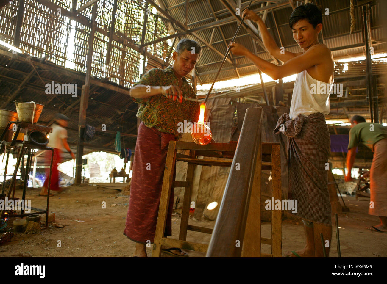 glass making, family-owned glass factory, Myanmar, Burma Stock Photo
