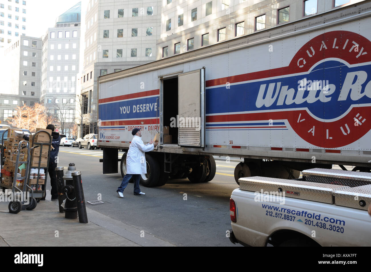 Workers unload a food truck in Battery Park City, Manhattan. Stock Photo
