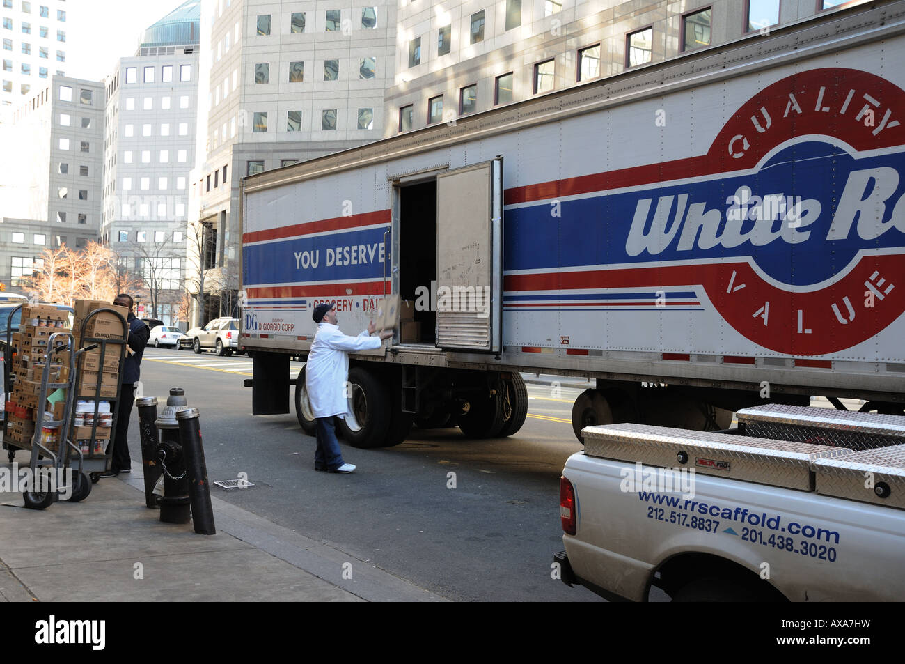 Workers unload a food truck in Battery Park City, a neighborhood in Manhattan. Stock Photo