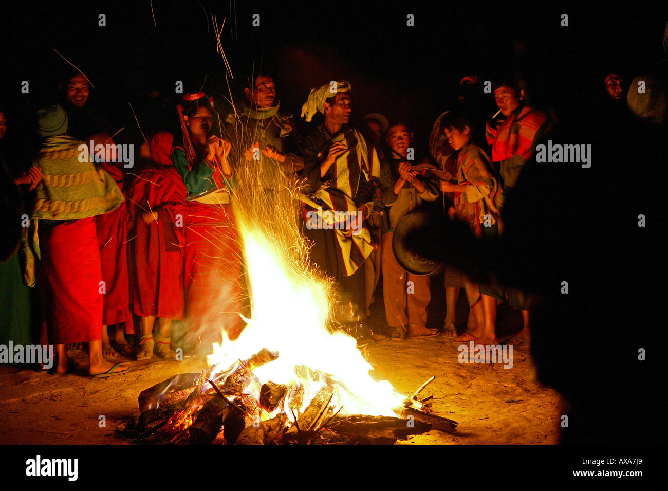 dancing round campfire, Palaung hill tribe, Yasagyi Hills, Myanmar Stock Photo