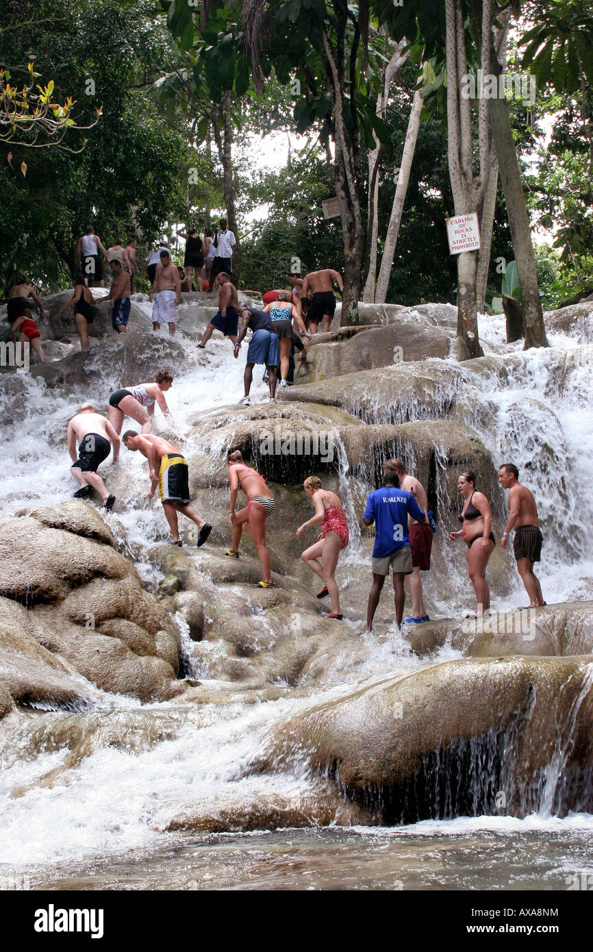 People climbing Dunns River Falls Ocho Rios Jamaica Stock Photo