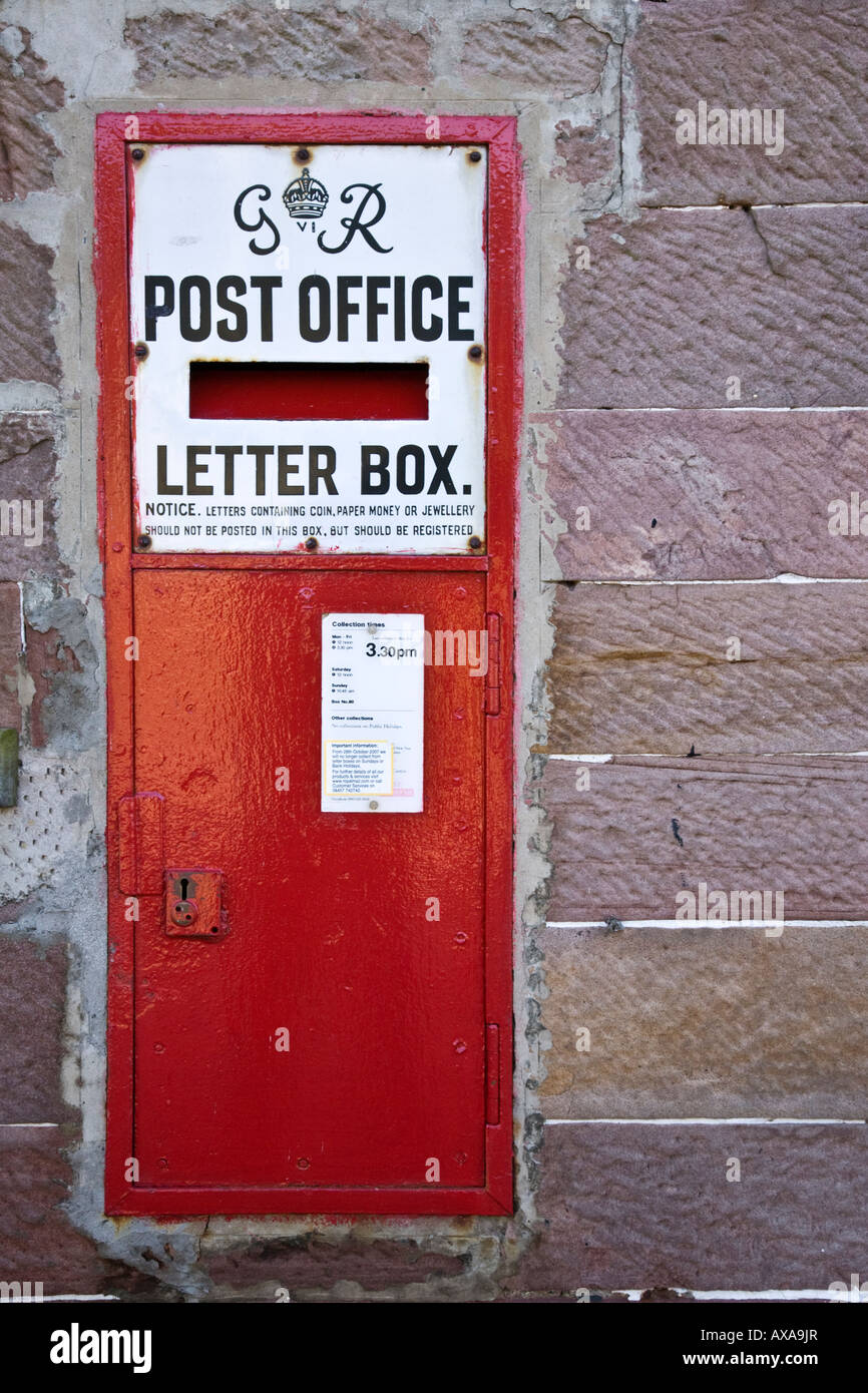 British Post Office VI red letter box set into a wall Britain