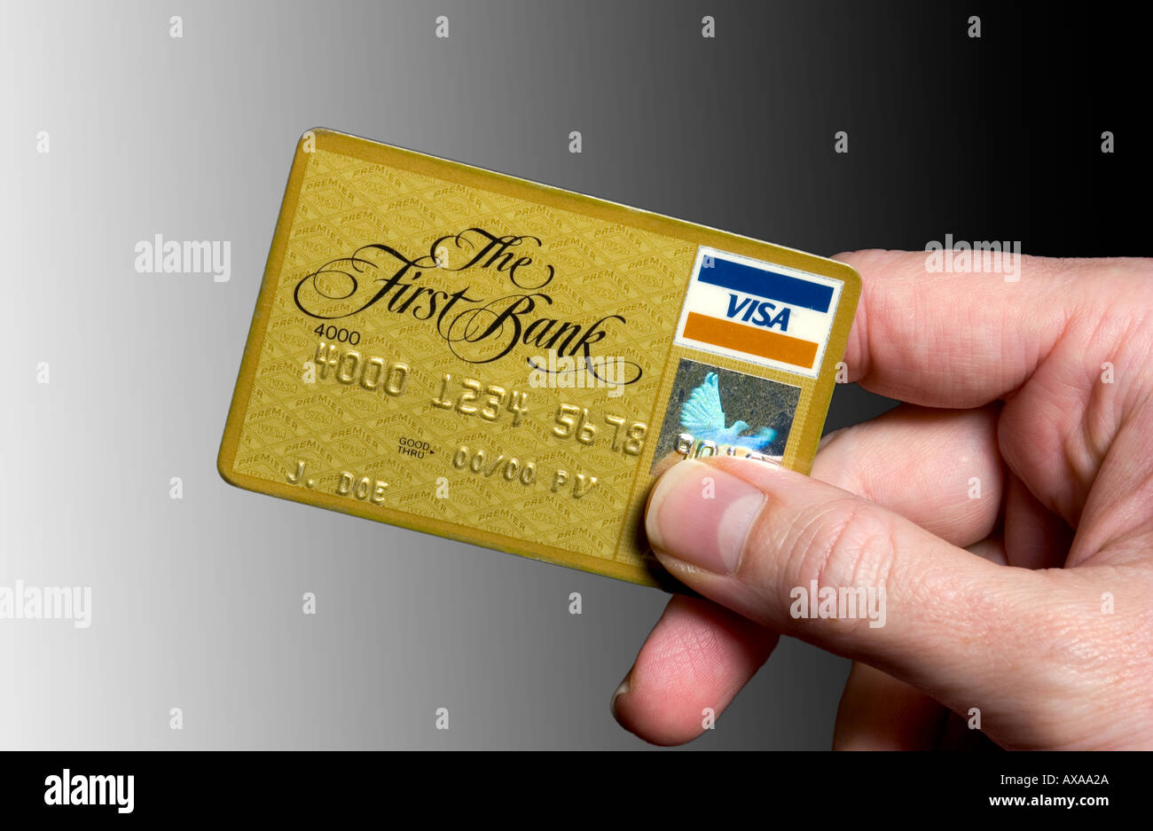 hand with gold credit card Stock Photo Alamy