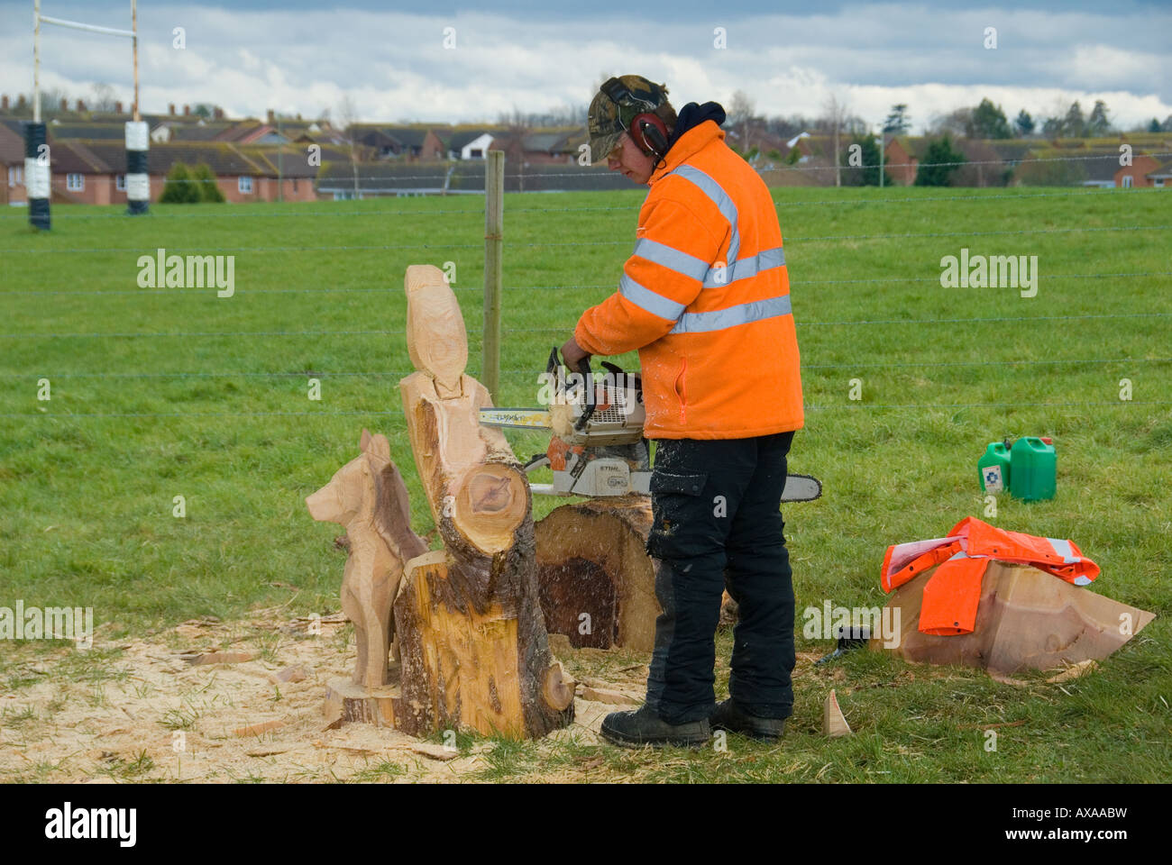 A Wood Carver Using a Chainsaw Stock Photo Alamy