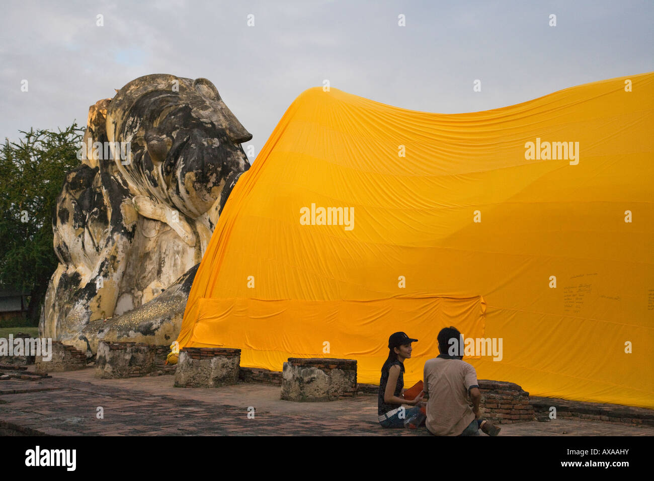 Tourists with Reclining Buddha Ayutthaya Thailand Stock Photo