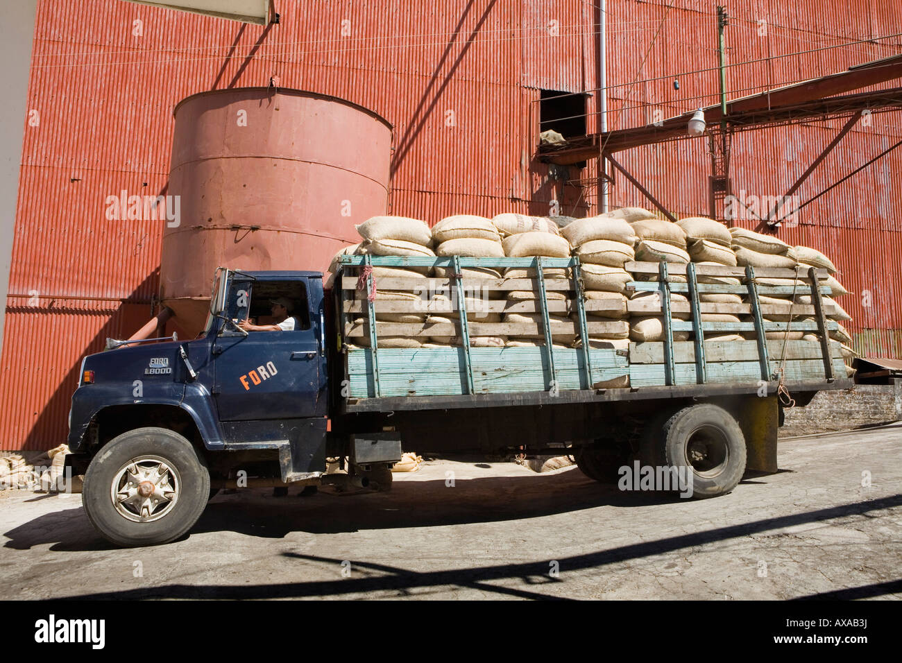 Burlap sacks of beans on truck at La Majada coffee cooperative El Stock