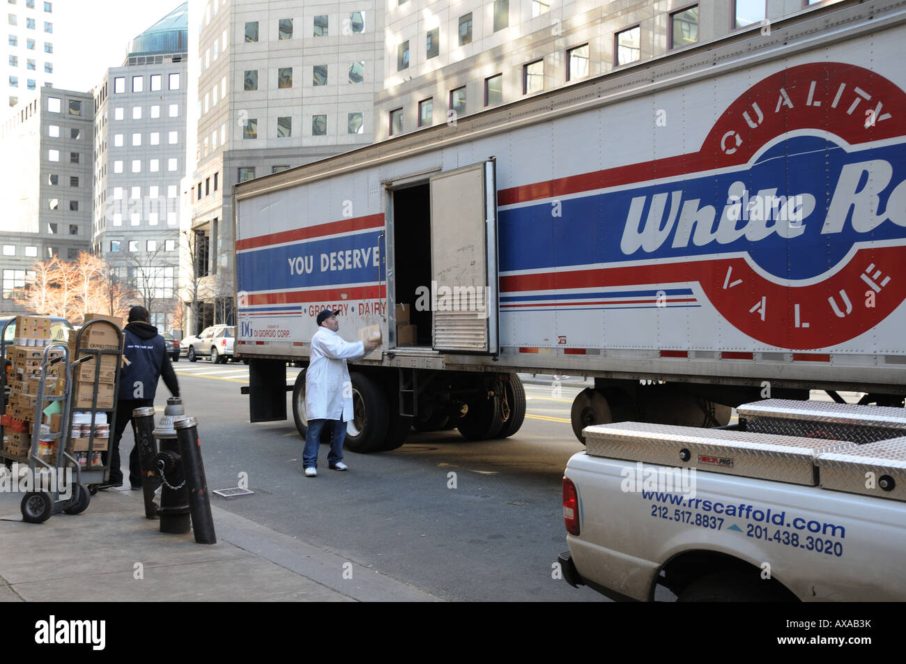 Workers unload a food truck in Battery Park City, Manhattan. Stock Photo