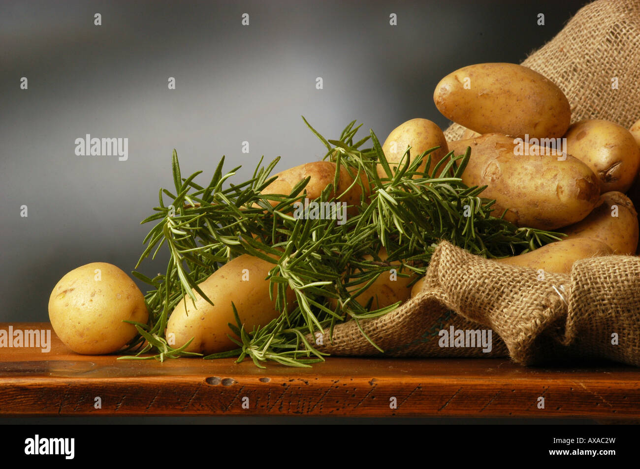 Potatoes and rosemary Stock Photo