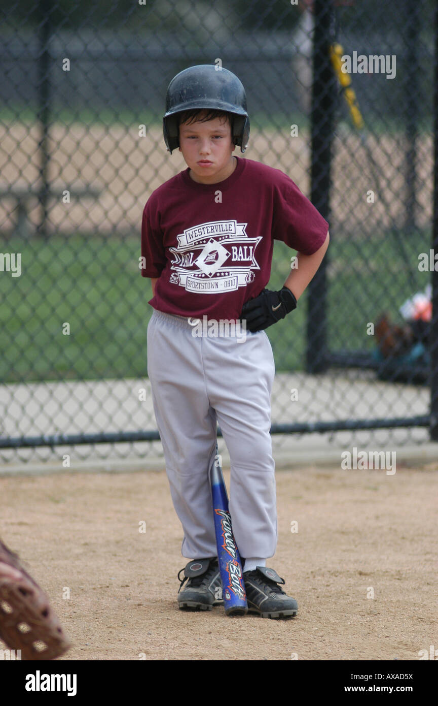 Eight year old tough guy baseball player gets ready to bat Westerville