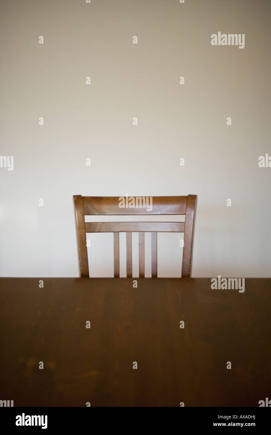 Wooden Chair at table simple symmetry Stock Photo