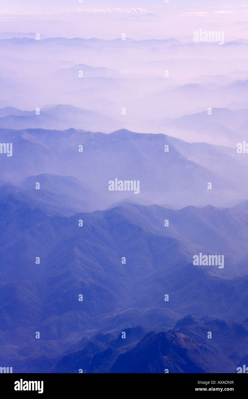 Aerial view of mountain layers in cloud Southeast Asia Stock Photo - Alamy