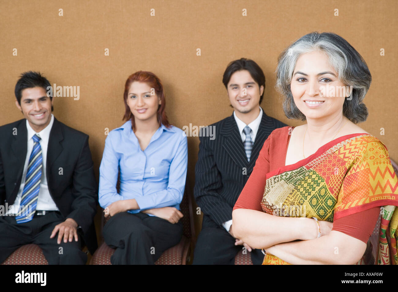 Women standing with crossed legs hi-res stock photography and images ...