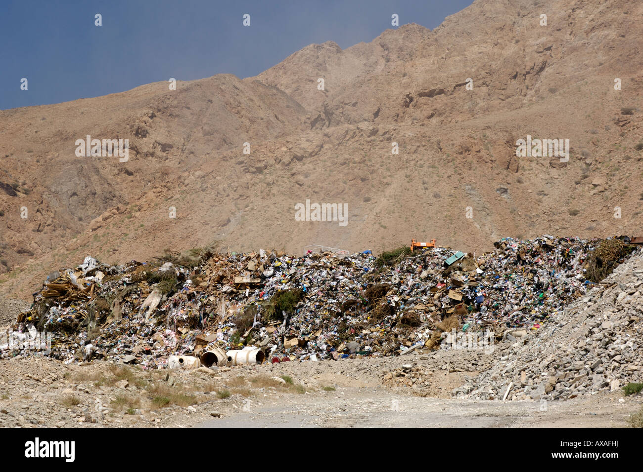 Rubbish tip in the mountains near Muscat in Oman. Stock Photo