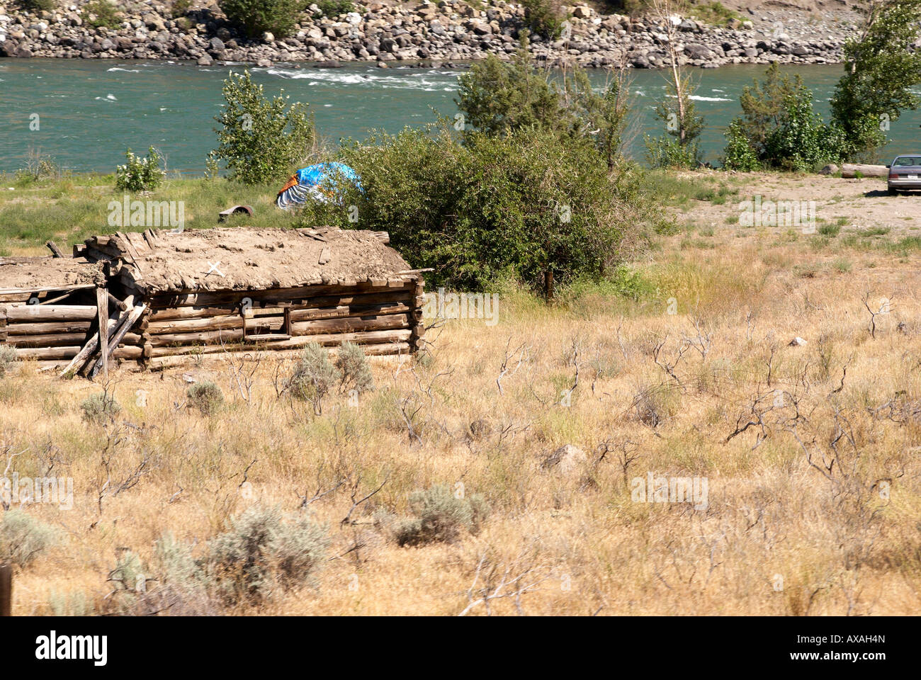 Derelict And Abandoned Log Cabin Farmstead In The Thompson River