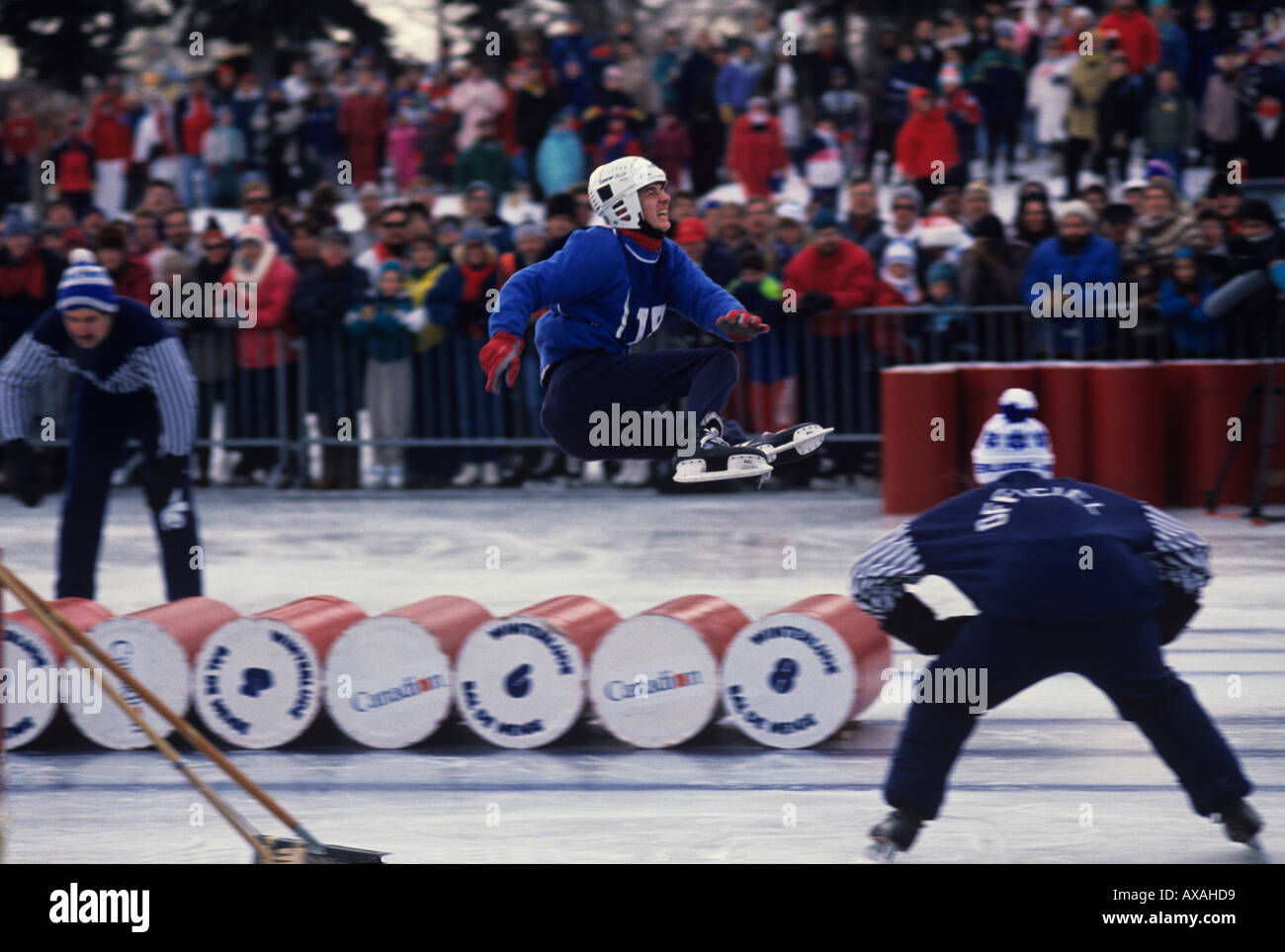Ice skating competition to jump across the most barrels Winterlude