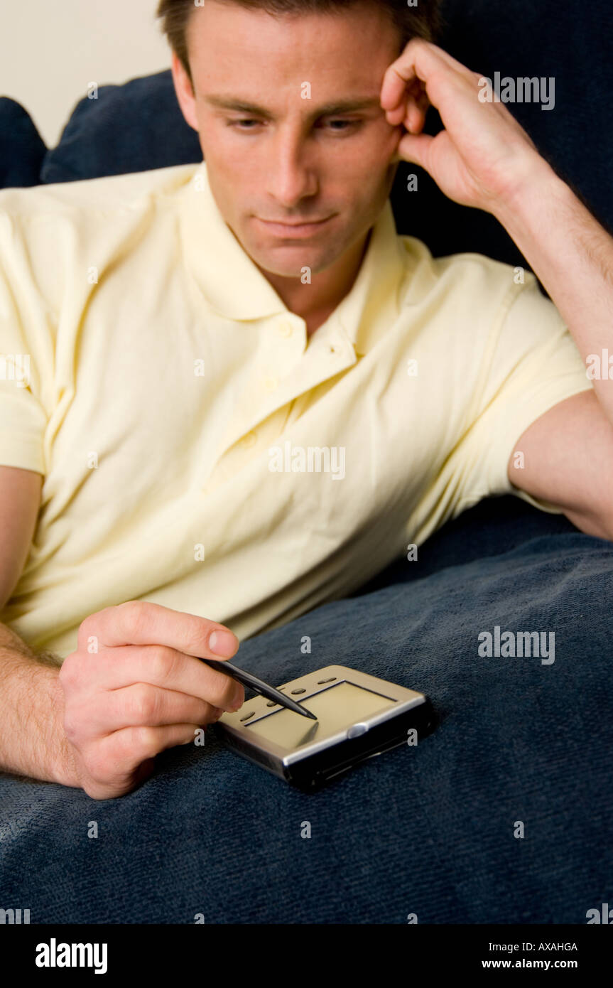 man using a PDA Stock Photo
