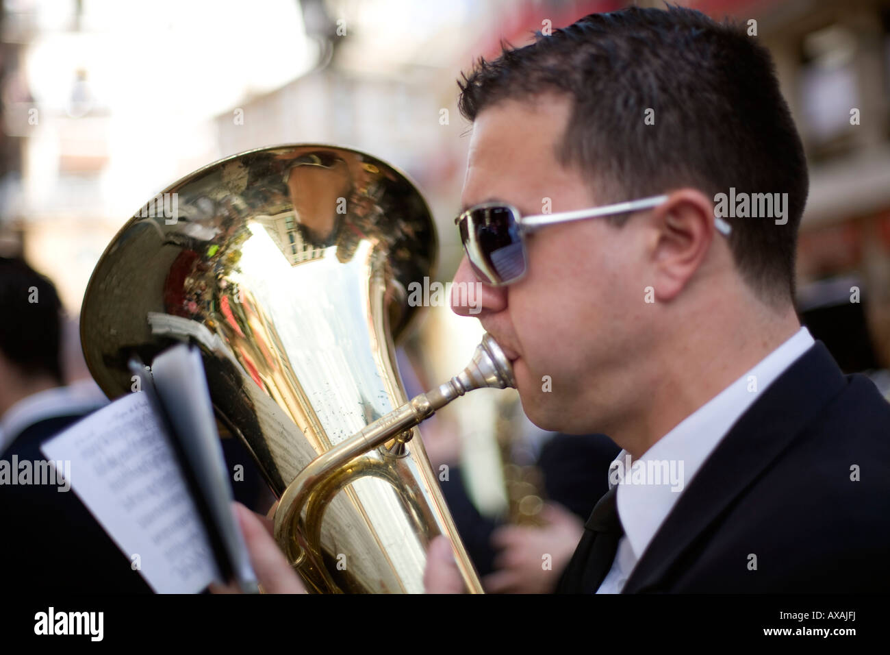 Musician blowing a tuba, Seville, Spain Stock Photo Alamy