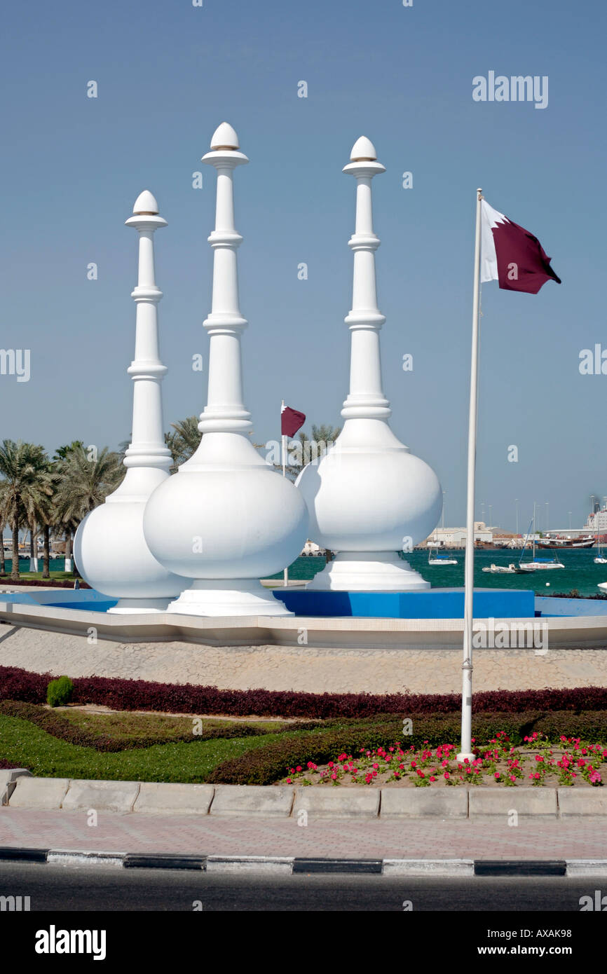 Monument in the shape of perfume bottles on a roundabout in Doha in ...