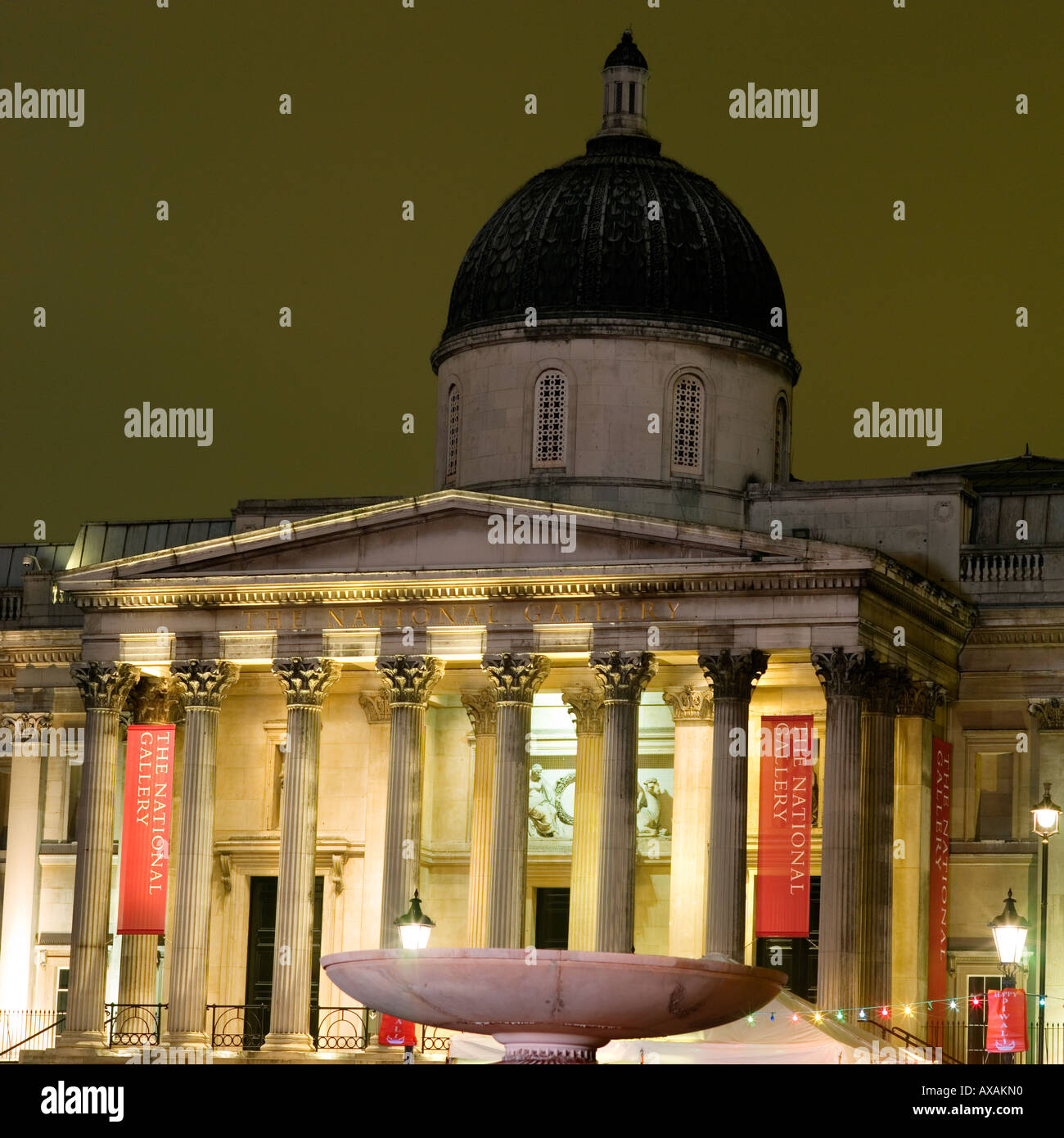 National Gallery from Trafalgar Square illuminated at night Stock Photo