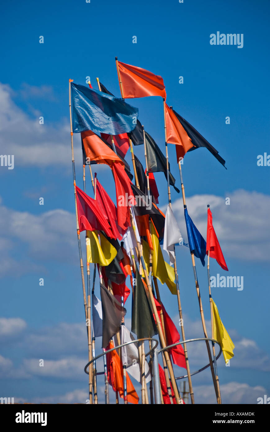A bunch of coast fishing flags flying in the wind Stock Photo - Alamy