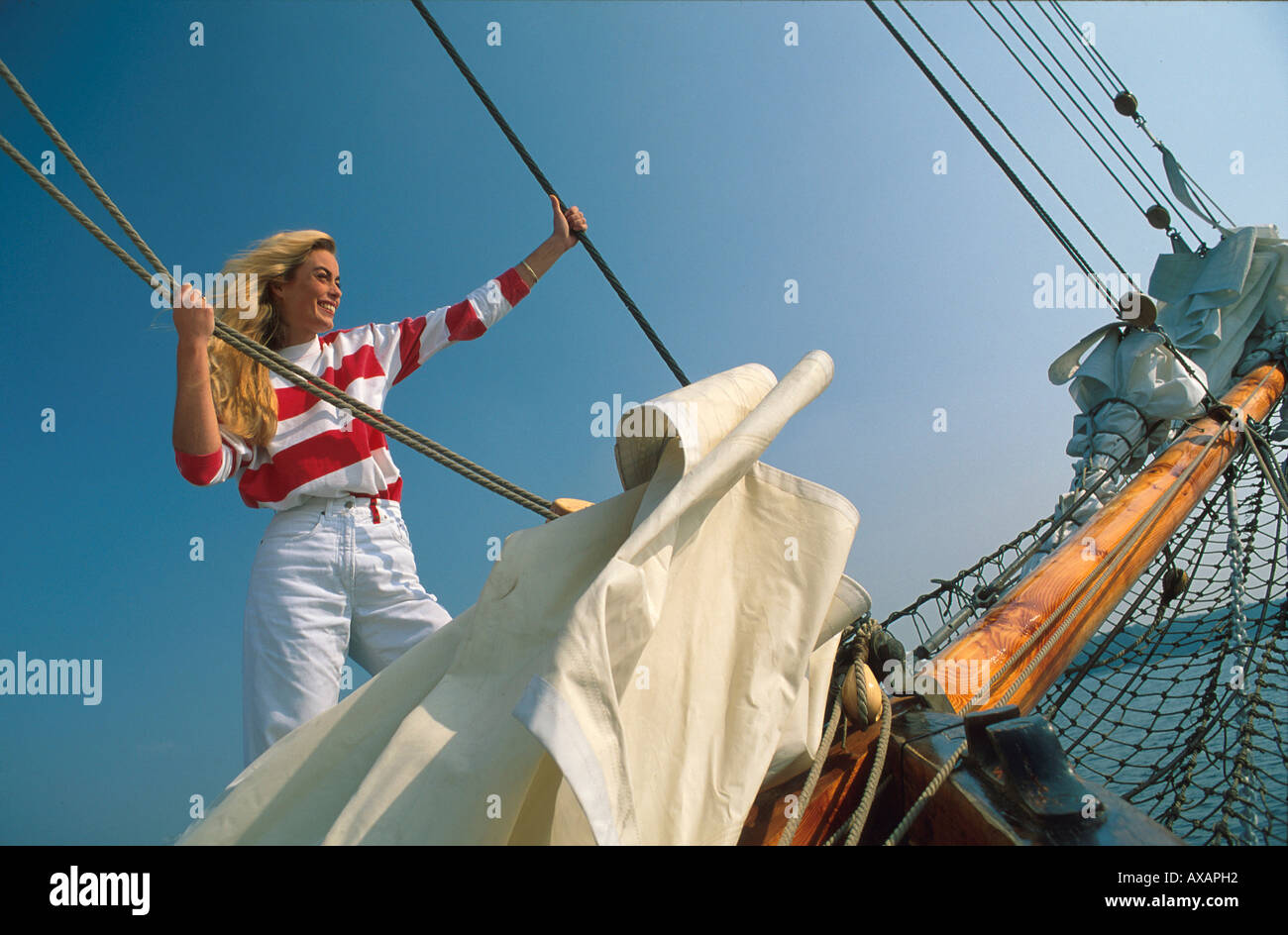Frau auf Segelyacht, Daenemark Stock Photo