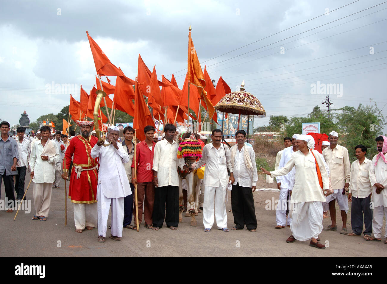 Crowd with saffron flags in Dindi Ashadhi Ekadashi festival at