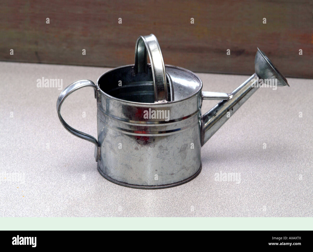 Small galvanized watering can suitable for a child Stock Photo Alamy