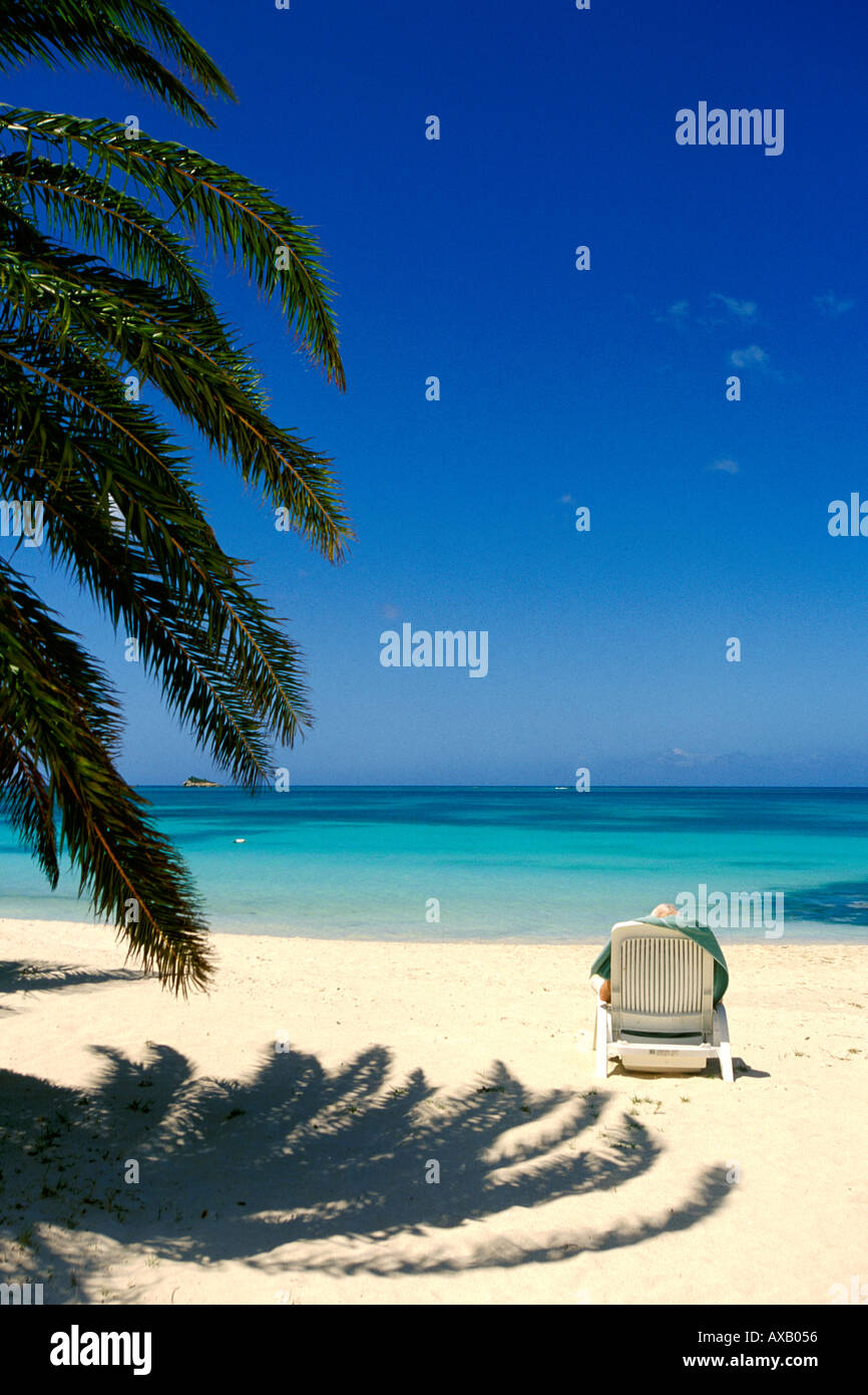 Antigua, Dickenson Bay, Beach chair Stock Photo