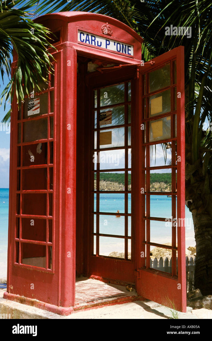 Antigua, Dickenson Bay, Telephone booth and palms Stock Photo