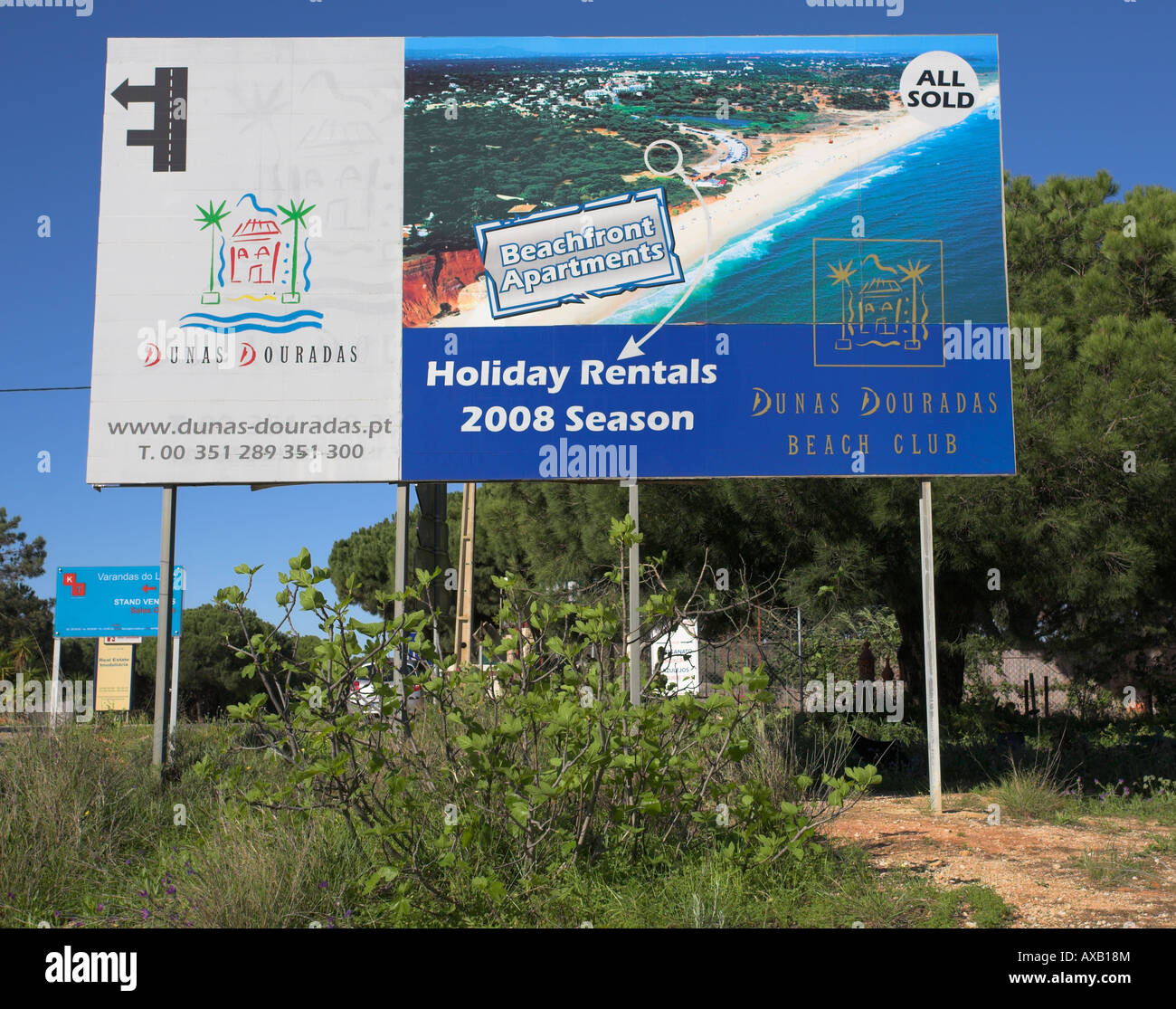 Roadside hoardings advertising a new coastline development on the sunshine coast of the Algarve. Stock Photo